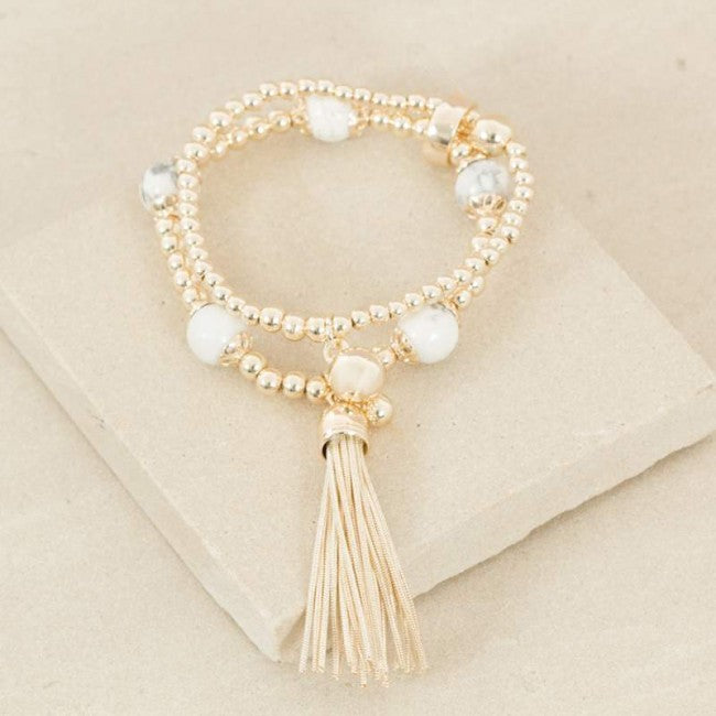 BRACELETS + RINGS